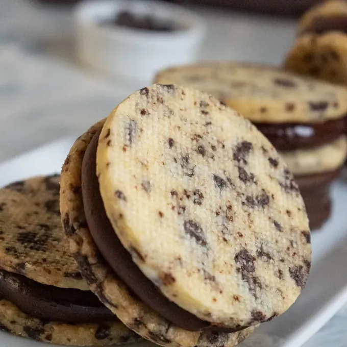Cookies and cream vegan alfajores filled with chocolate ganache